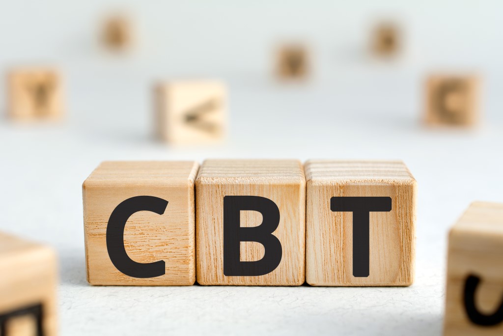 children's blocks that spell out CBT, to represent Cognitive Behavioral Therapy